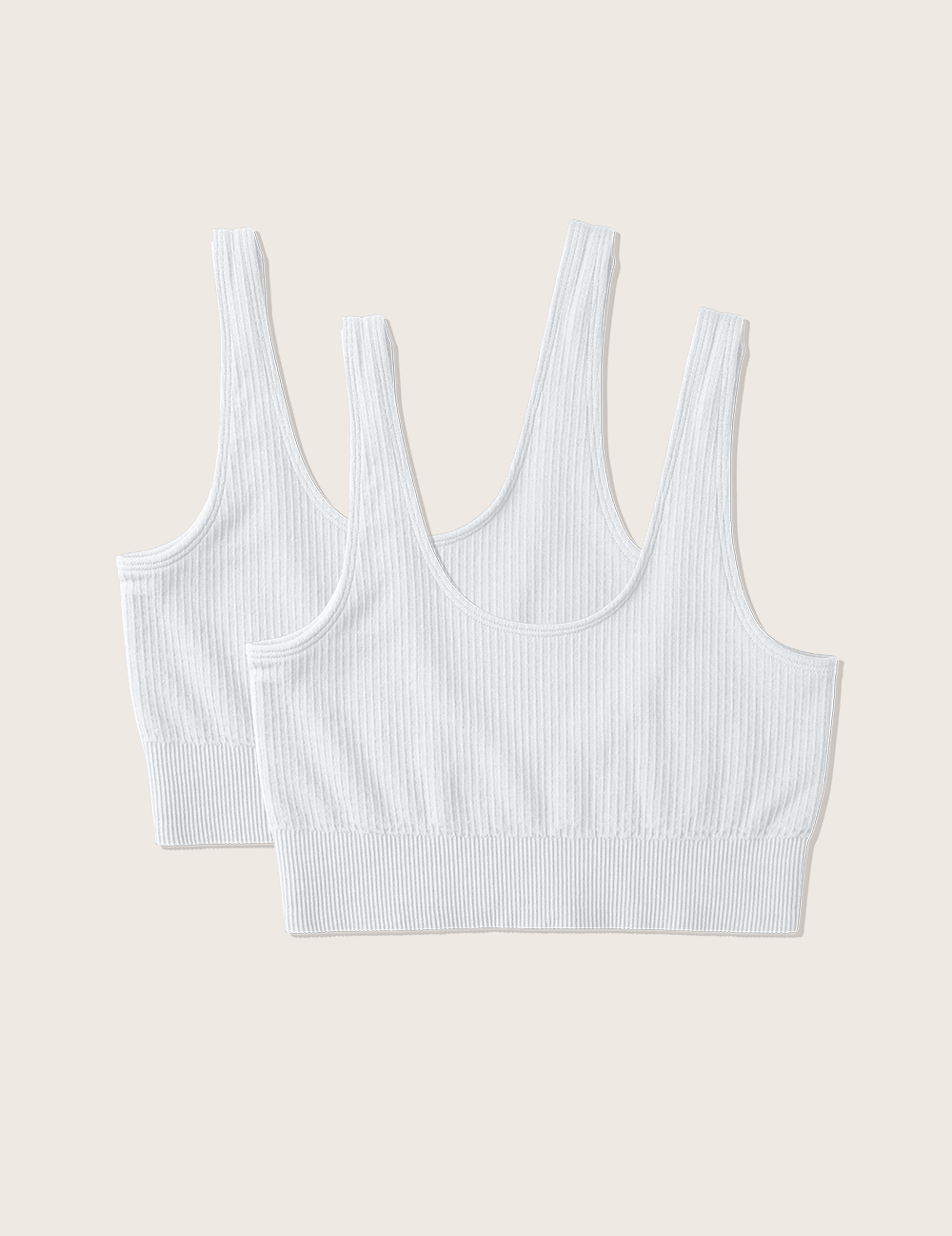 Boody ribbade sömlösa BH är gjord av ett elastiskt, ribbstickat bambutyg som andas. Den kan bäras som underdel eller som en crop top och har en perfekt balans mellan stil och komfort. Ryggen är mjuk och det breda resårbandet under bysten ger stöd hela dagen. BH:n har breda, icke justerbara axelband i en sömlös design. Den har ingen vaddering men är dubbelskiktad för både stöd och komfort.