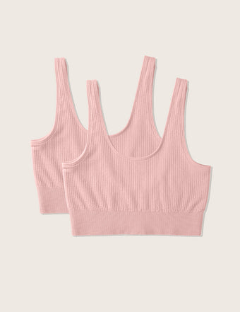 Boody ribbade sömlösa BH är gjord av ett elastiskt, ribbstickat bambutyg som andas. Den kan bäras som underdel eller som en crop top och har en perfekt balans mellan stil och komfort. Ryggen är mjuk och det breda resårbandet under bysten ger stöd hela dagen. BH:n har breda, icke justerbara axelband i en sömlös design. Den har ingen vaddering men är dubbelskiktad för både stöd och komfort.